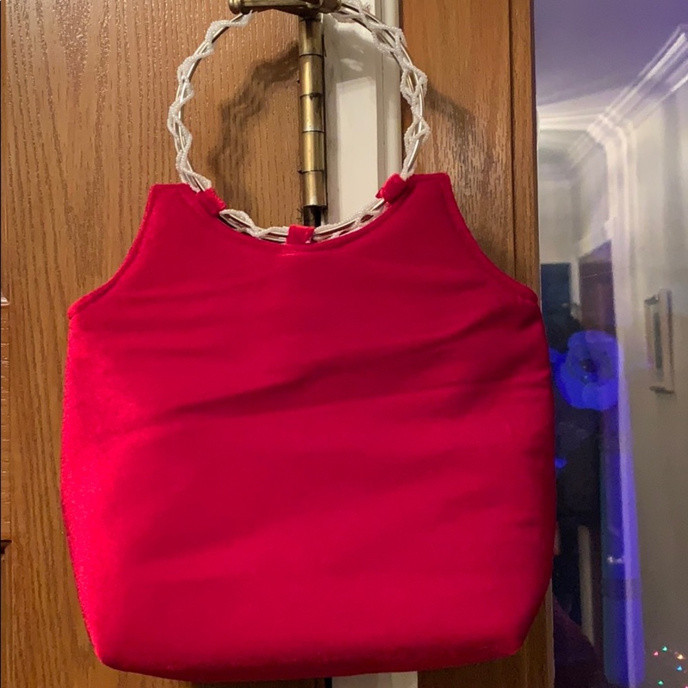 Red faux velvet purse with round handle